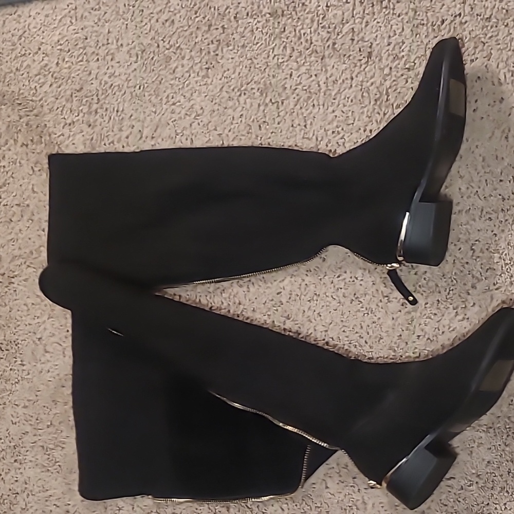 Sexy ladies black with gold trim suede boots.